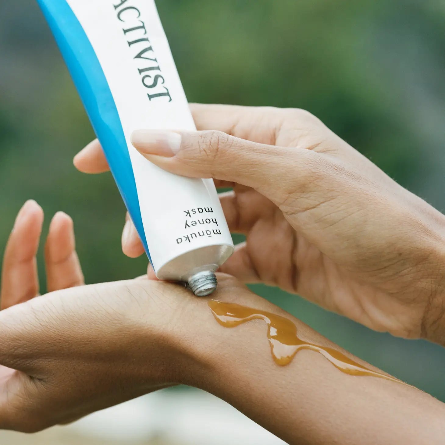 girl using Manuka Honey Mask